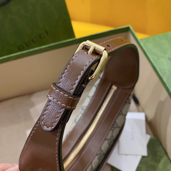 G*u*i half-moon-shaped mini bag with interlocking g